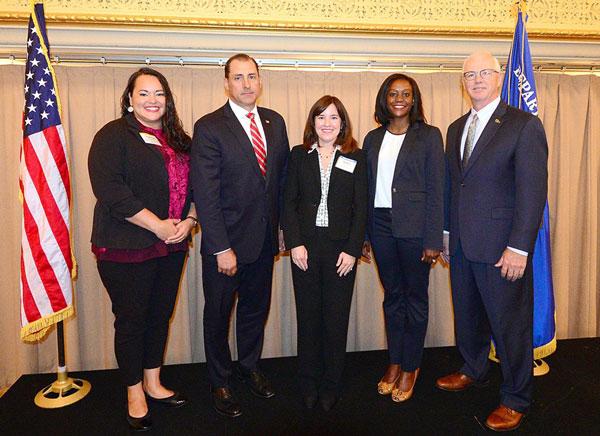 Opening speakers from the first day of the 2019 National Symposium on Sex Offender Management and Accountability included Theresa Faris of the Cheyenne and Arapaho Tribes (from left), U.S. Attorney for the Northern District of Illinois John R. Lausch Jr., acting SMART Office Director Dawn Doran, National Coordinator for Child Exploitation Prevention and Interdiction and Human Trafficking Coordinator for the Department of Justice Stacie B. Harris, and President and CEO of the National Center for Missing and 