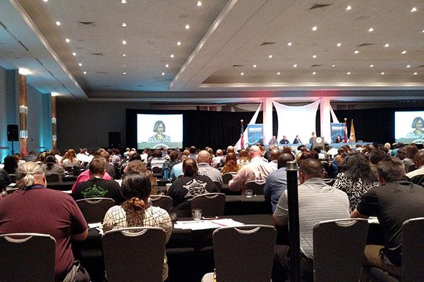 AAG Karol Mason addresses the 2016 National Symposium attendees.